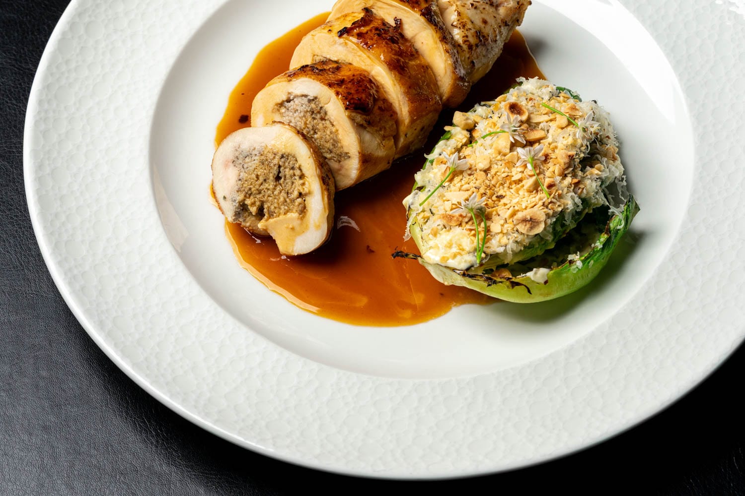 Stuffed chicken ballotine with charred cabbage at Restaurant Lucie