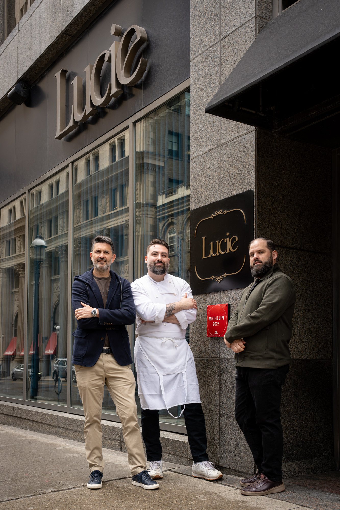 Partners Yannick Bigourdan, Chef Michael Angeloni, and Adam Teolis outside Restaurant Lucie